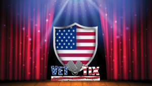 AI-generated red stage curtains with stage lights present lighting up an American flag shield and featuring the VetTix logo, which is trademarked by VetTix