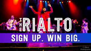 Photo of live performance at the Rialto Theatre with text that reads "Sign up. Win Big."