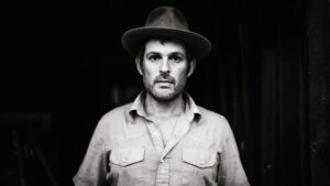 Black and white image of Gregory Alan Isakov