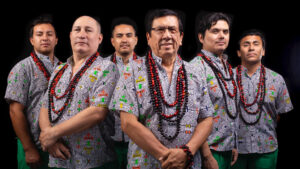 Photo of Los Mirlos against a black background